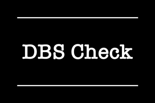 The words 'DBS Check' on a black background